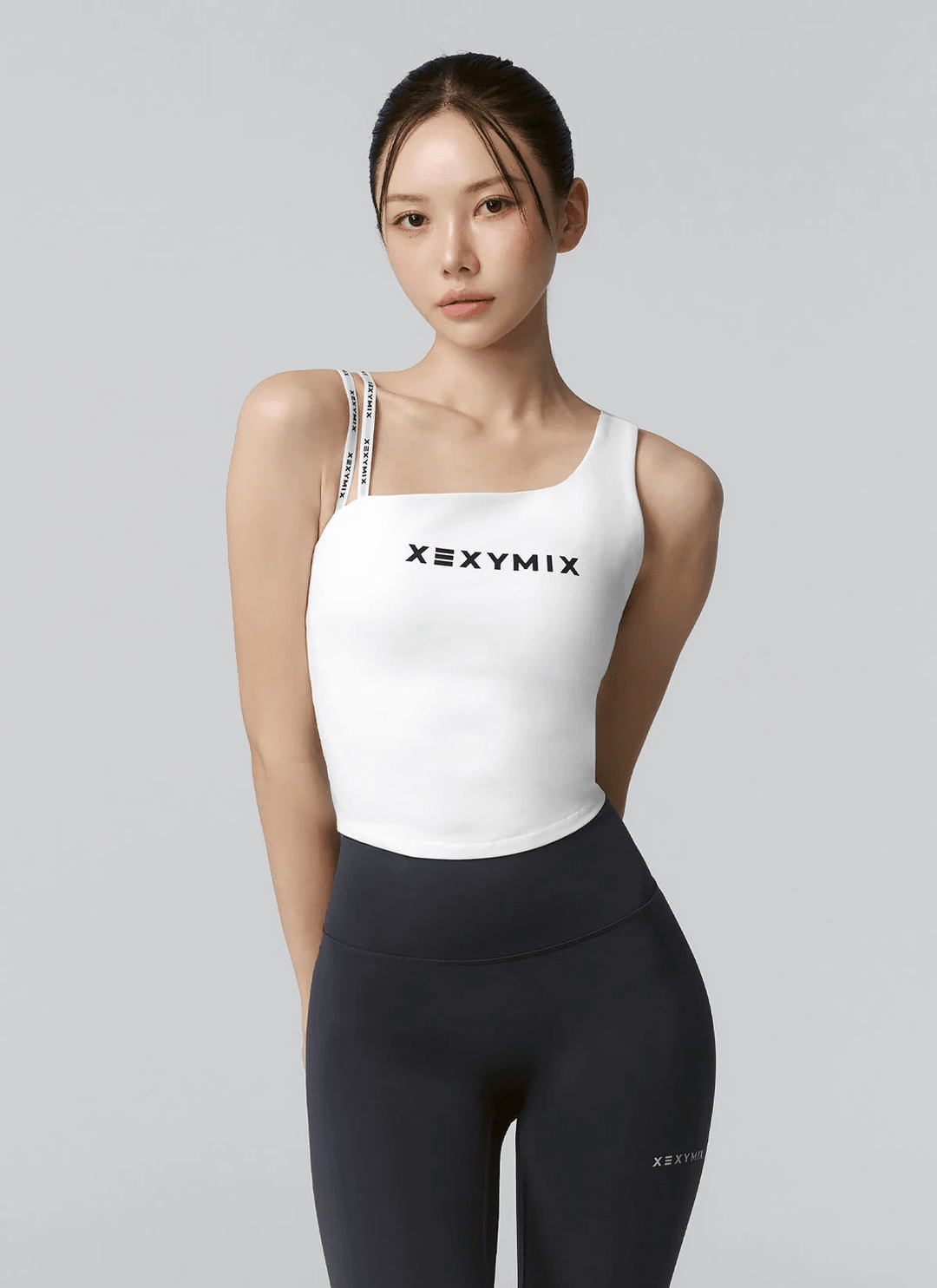 XEXYMIX Unbalanced Logo Banding Crop Top in Black — image 1