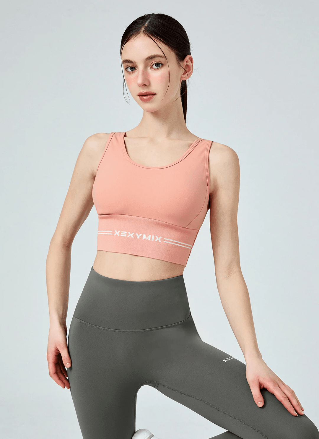 XEXYMIX Black Label Signature Power Rise Logo Banding Bra Top in Vivid Peach — image 2