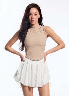 XEXYMIX Soft Ribbed Piping Mock Neck Sleeveless Top in Bunny Beige — image 4