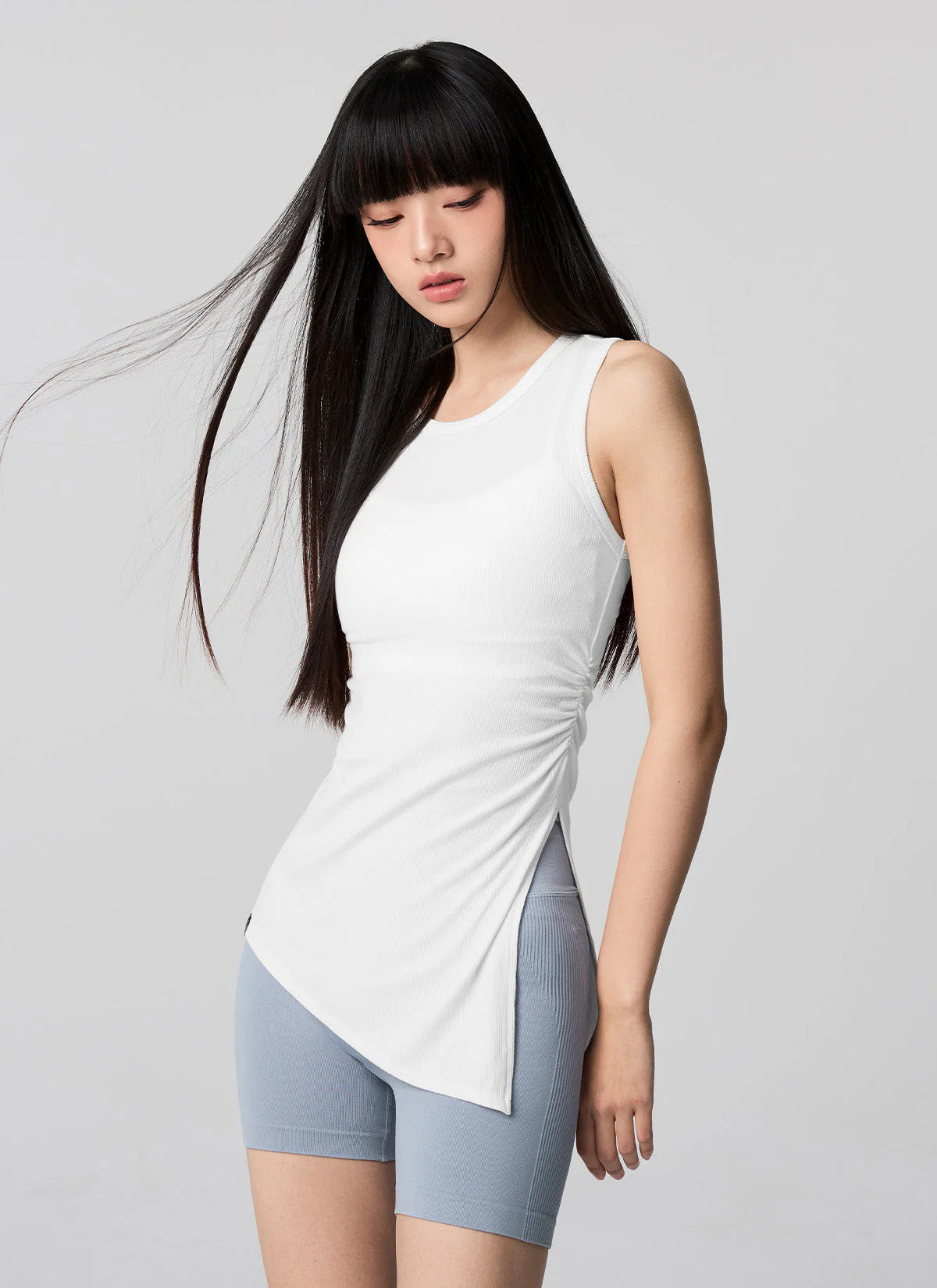 XEXYMIX Ribbed Unbalanced Slit Sleeveless in Ivory — image 1