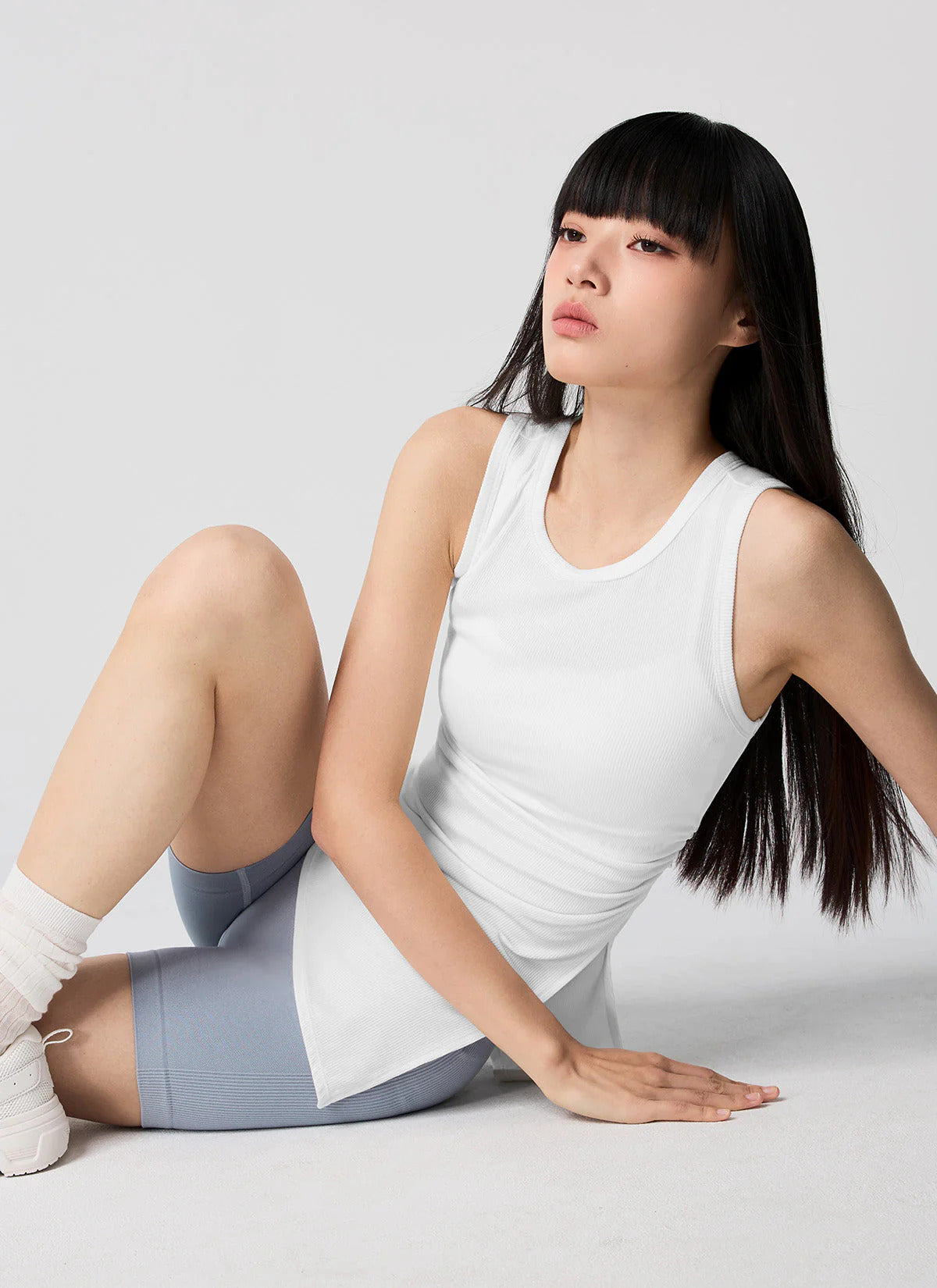 XEXYMIX Ribbed Unbalanced Slit Sleeveless in Ivory — image 4