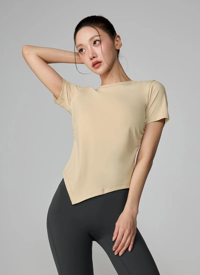 XEXYMIX Ice Feather Light 2.0 Asymmetric Shirring Short Sleeve Top in Ginger Beige — image 3