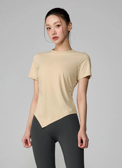 XEXYMIX Ice Feather Light 2.0 Asymmetric Shirring Short Sleeve Top in Ginger Beige — image 4