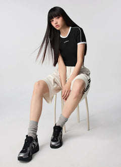 XEXYMIX Contrast Piping Point Short Sleeve Top in Black — image 4