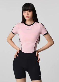 XEXYMIX Contrast Piping Point Short Sleeve Top in Shy Pink — image 1